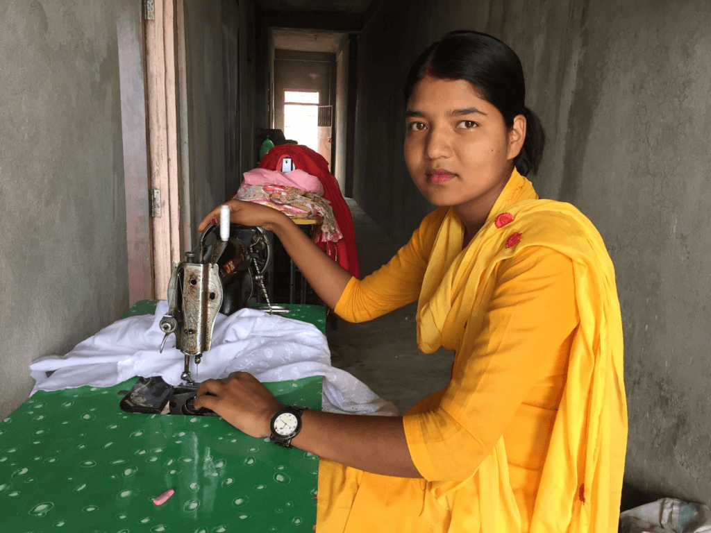 Nepali woman sewing