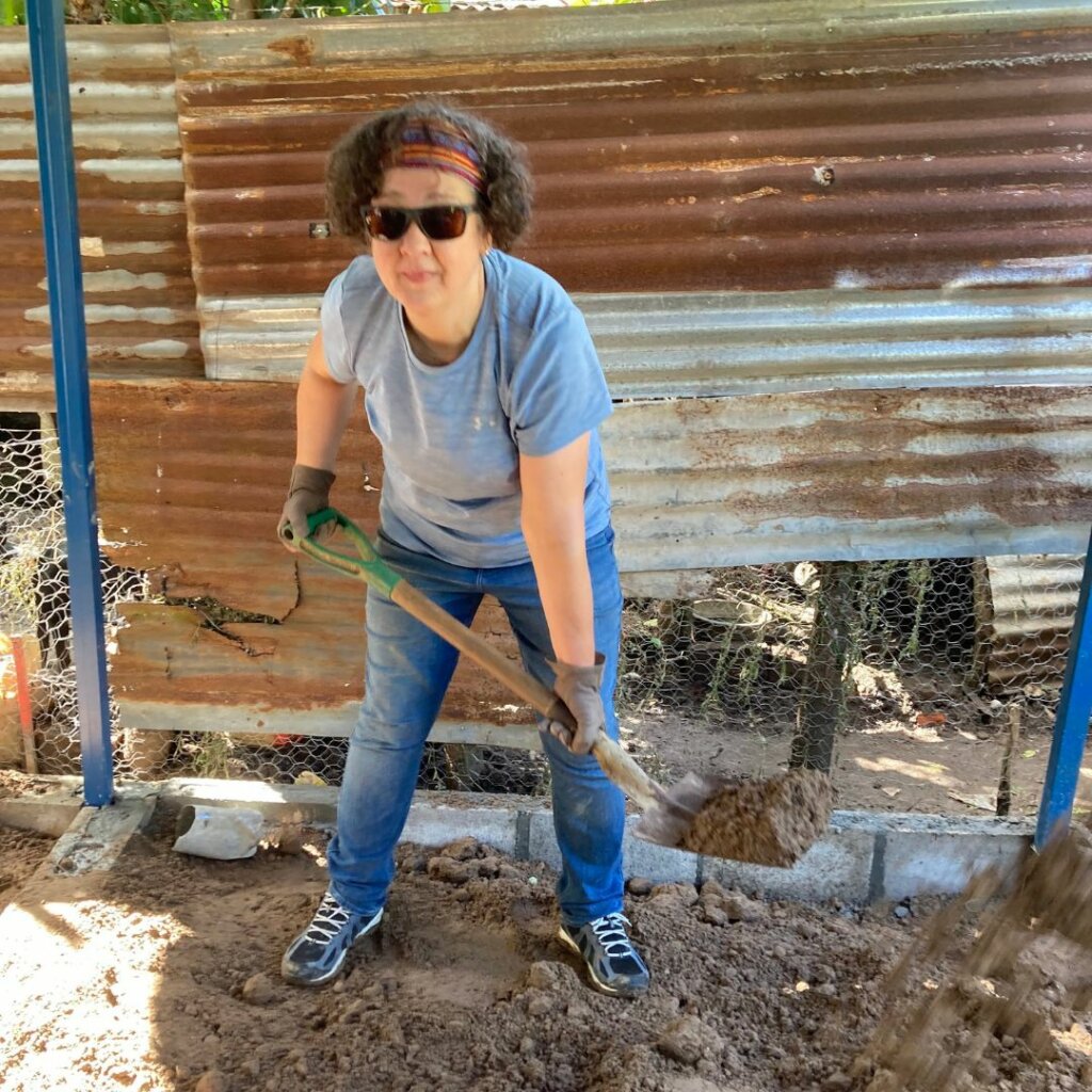 Woman with shovel